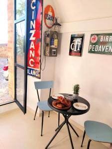 a table with some food on it in a room at Al vecchio Incasato in Grottammare