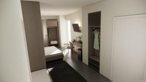a bathroom with a bed and a sink and a mirror at Adua Rooms - Tropea Center in Tropea