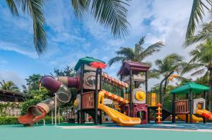 a childrens playground with slides and a slidesktop at Yalong Bay Mangrove Tree Resort in Sanya