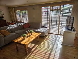 a living room with a couch and a coffee table at Parel in Makkum in Makkum