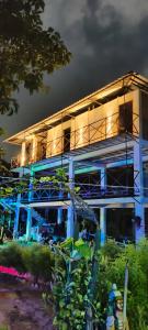 a building under construction with lights on it at ChangGhor in Digru