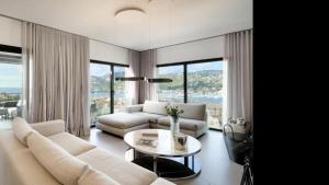 a living room with a couch and a table at The One in Port d'Andratx