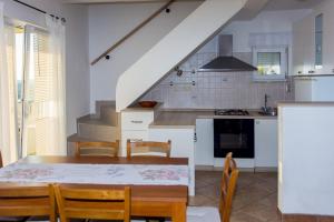 Kuchyňa alebo kuchynka v ubytovaní Gospodar Apartments