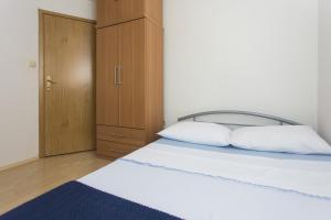 Posteľ alebo postele v izbe v ubytovaní Gospodar Apartments