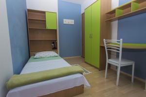 Posteľ alebo postele v izbe v ubytovaní Gospodar Apartments
