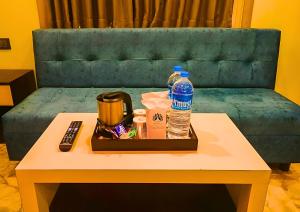 a tray with two bottles of water on a table at Mohar Residency - VIP Road in kolkata