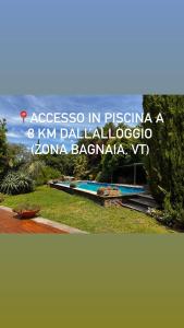 a poster with the wordsascosa in pisgina and kinemale at Clock House in Viterbo