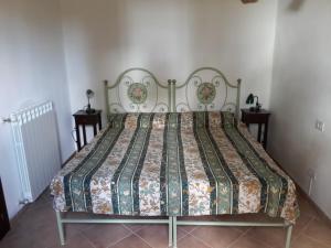 Postel nebo postele na pokoji v ubytování Fattoria Casanova