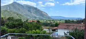 a view of a valley with mountains in the background at Zois Apartment in Gliki