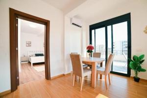 a dining room with a table and chairs at MaNora in Ulcinj