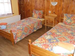 Postel nebo postele na pokoji v ubytování Veselata Guest House