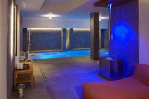 a room with a pool in the middle of a room at Hotel Edelweiss 3 Stelle SUPERIOR in Breuil-Cervinia