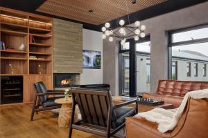 a living room with a couch and a fireplace at Tindasel - The Farm in Hella