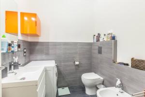 a bathroom with a toilet and a sink at De' Fusari, Bologna by Short Holidays in Bologna +20 photos