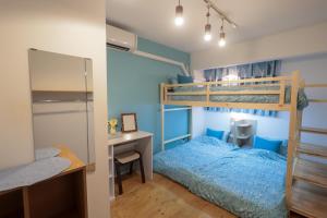 a bedroom with a bunk bed and a desk at Tokyo Candle house in Tokyo +56 photos