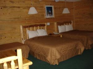 Postel nebo postele na pokoji v ubytování Georgetown Mountain Inn