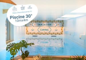 a swimming pool with the words piske of the istg at Appart'Hôtel & Spa "Les Voiles" Le Houat in Carnac
