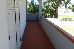 a room with a balcony with a door at Casa al Mare Ingresso Indipendente in Casalbordino