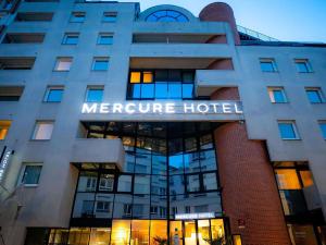 a building with a meer centre hotel at Mercure Paris Montparnasse Pasteur in Paris +147 photos