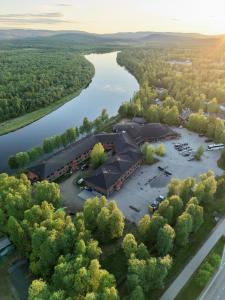 an aerial view of a building next to a river at Hotel Ivalo in Ivalo