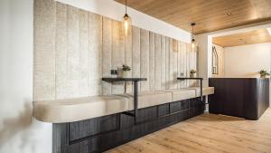 a bathroom with two sinks in a room at apartments '43 in Reith im Alpbachtal +36 photos