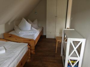 Кровать или кровати в номере Haus Sonnenblume
