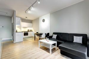 Kuchyňa alebo kuchynka v ubytovaní Apartments Brabank Old Town & by Noclegi Renters