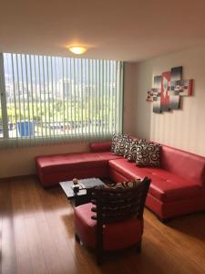 Posezení v ubytování Misuitehotel La Carolina Quito