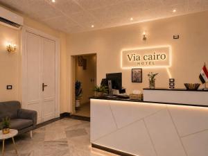 a lobby of a va echo hotel with a reception desk at Via Cairo hotel in Cairo