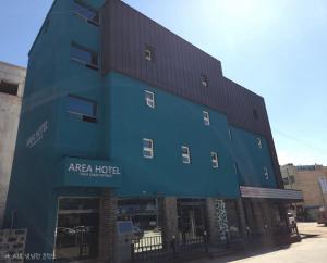 a large blue building with the words area hotel at AREA HoTEL in Yeongju