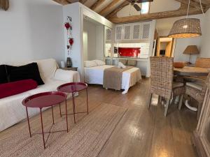a living room with a couch and a table at Casas Lapa in Costa Teguise