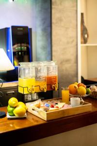a glass of orange juice sitting on top of a counter at SUNDOS Feria Valencia in Valencia