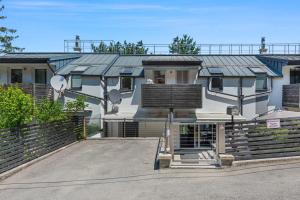 a house with a solarium on top of it at Villa Donau - Sauna & Whirlpool in Vienna