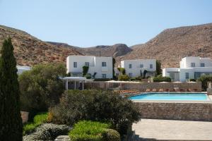 a view of a resort with a swimming pool at ANEMI Folegandros in Karavostasi