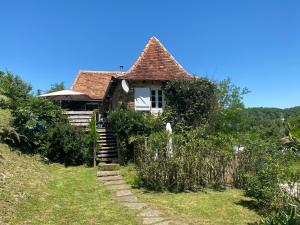 a house on the side of a hill at la cachette bas in Salies-de-Béarn +9 photos