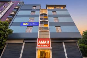 a front view of the amar residency hotel at FabHotel Amar Residency, Sector 7, Dwarka in New Delhi