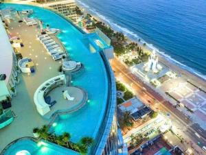an aerial view of the beach and the ocean at Panorama Beach Win Nha Trang in Nha Trang