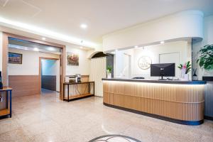 a lobby of a hospital with a reception desk at Hotel Traum in Gapyeong