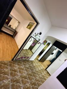 a staircase in a house with a mirror at Hypnotic Suite 1 in Piteşti
