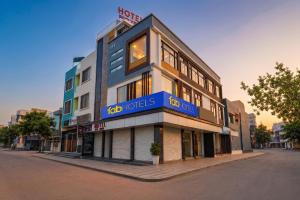 a building with a sign on the side of it at FabHotel Skyview in Bhopal
