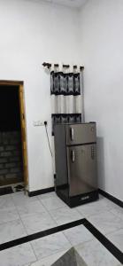 a small appliance in a room with a wall at Queens luma villa in Arugam Bay +3 photos