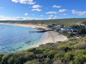 a view of a beach with houses and the ocean at Beach Studio with Ocean View in Gnarabup