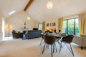a living room with a table and chairs at 2 Bed in Buxted oc-t44744 in Buxted