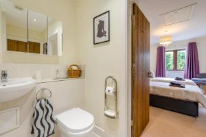 a bathroom with a sink and a toilet in a room at 2 Bed in Buxted oc-t44744 in Buxted +22 photos