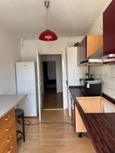 a kitchen with a counter and a red light at Marivel Wohnung in Freudenstadt