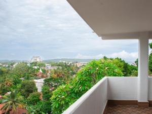 a balcony with a view of a city at Villa Hima Arana in Galle