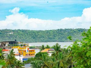 a view of the river and buildings at Villa Hima Arana in Galle
