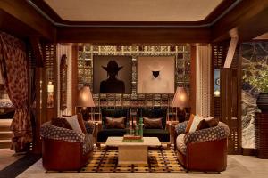 a living room with two chairs and a couch at Faraway Jackson Hole in Teton Village