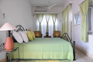 מיטה או מיטות בחדר ב-Savista Retreat