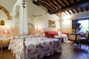 A bed or beds in a room at Poderi Arcangelo